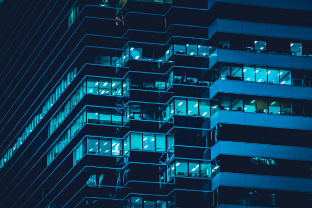 facade of modern building at night - hong kong china city night imagens e fotografias de stock