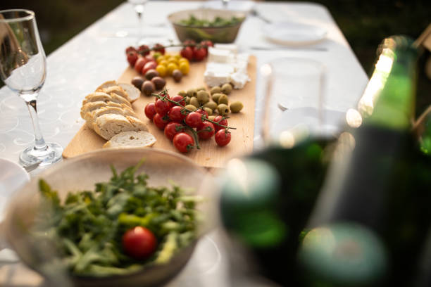 istock Dining table with appetizers for birthday party at backyard 1277558021