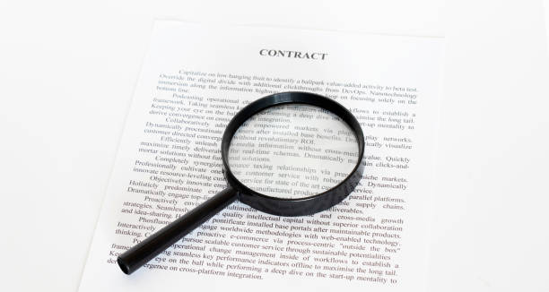 istock Magnifying Glass and document close up. Business concept 1277558272