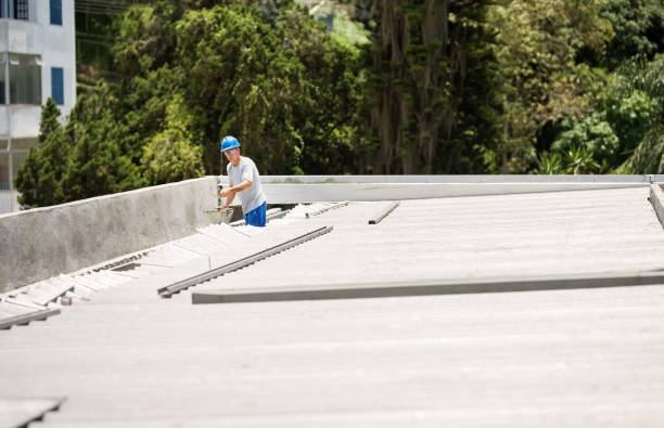 mason worker repairing rooftop leakage - plasterer construction site manual worker plaster imagens e fotografias de stock