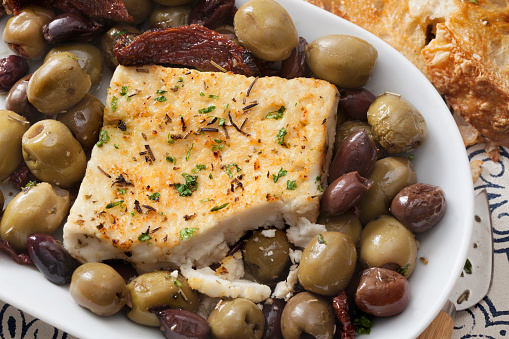 Baked Feta with Olives, Garlic and Sun Dried Tomatoes