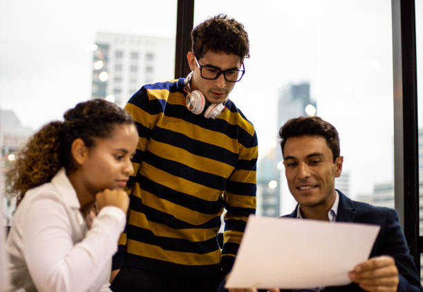 istock Happiness young business teamwork partnership talking and discuss in the office. 1277563780