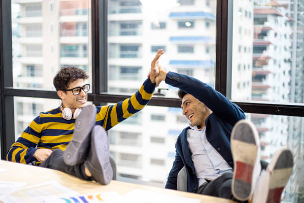 istock Happiness young business teamwork handshake in meeting room. 1277566953