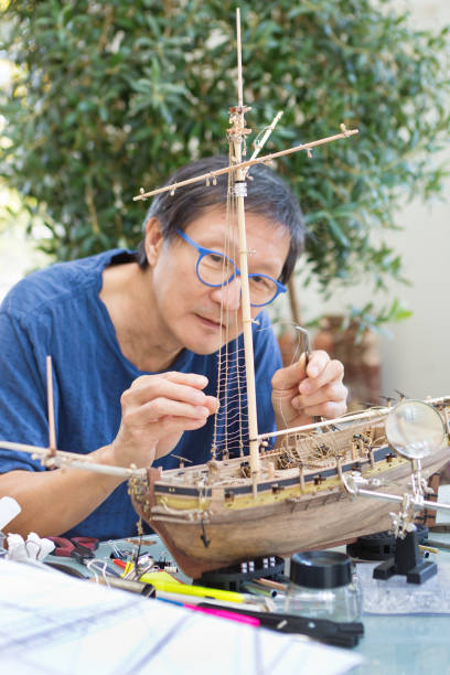 istock Retirement Hobby Leisure - Building Wooden Ship Kit Model 1277566985