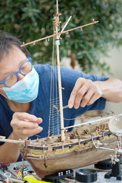 istock Retirement Hobby Leisure - Building Wooden Ship Kit Model 1277566998