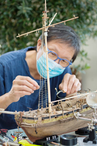 istock Retirement Hobby Leisure - Building Wooden Ship Kit Model 1277567011