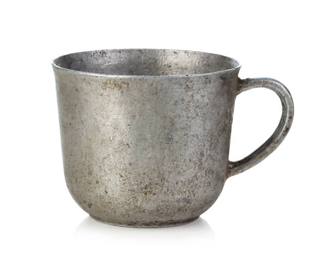 istock Antique iron cup isolated on white background. 1277567831