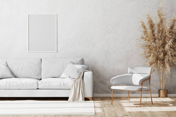 istock Blank white frame mock up in Light coloured minimalistic living room interior with white and gold sofa and armchair with decorative plaster wall and wooden parquet floor, 3d render 1277567868