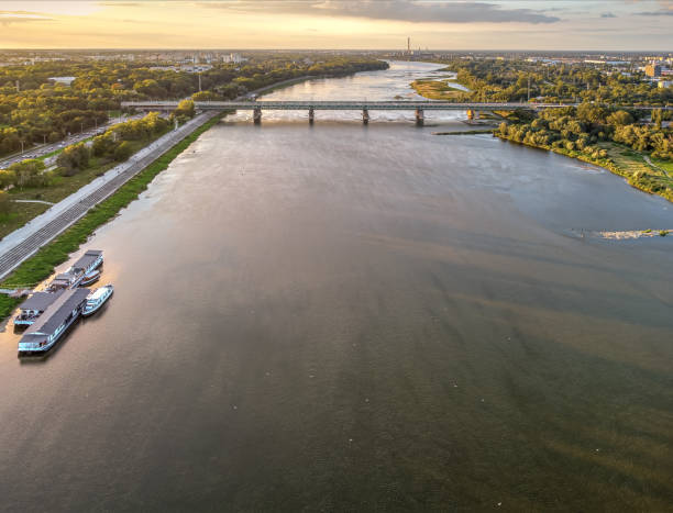 istock Large river that flow through big city. Drone, aerial view 1277568815