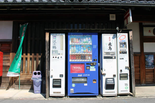 Vending machines and bins in Asuka village stock photo