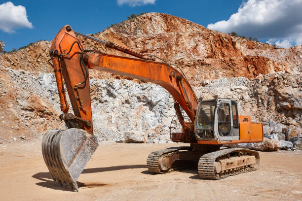 istock Heavy excavator on a quarry. Excavation machinery. Earthmover work 1277573722