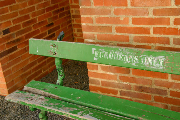 'Europeans only' bench Johannesburg, South Africa - Sep 3, 2005: During the apartheid years, only Europeans were allowed to sit on this bench. apartheid sign stock pictures, royalty-free photos & images