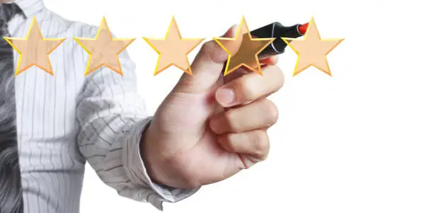 Photo of Hand draw five star rating. evaluation review concepts