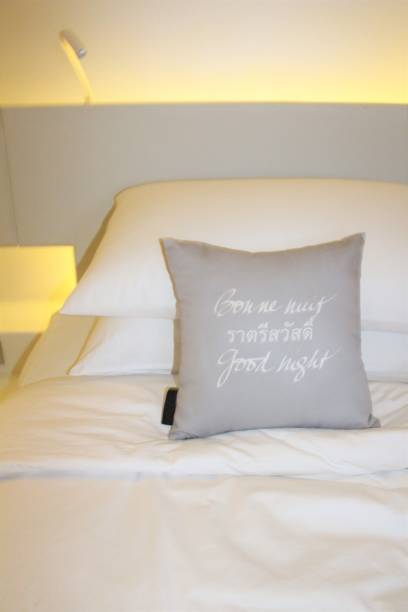 istock Good night cushion in hotel room. 1277578419