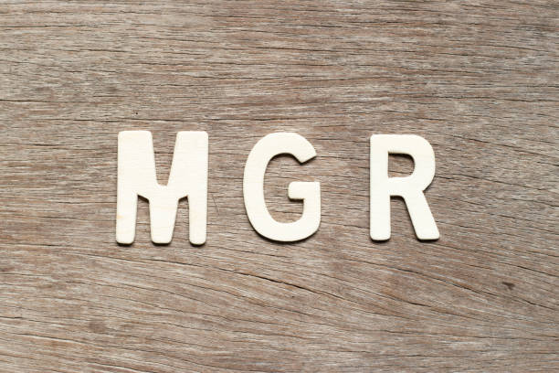 istock Alphabet letter in word mgr (abbreviation of manager) on wood background 1277578490