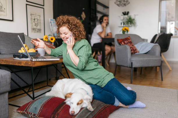 istock Happy young Caucasian redhead woman working from home 1277579177