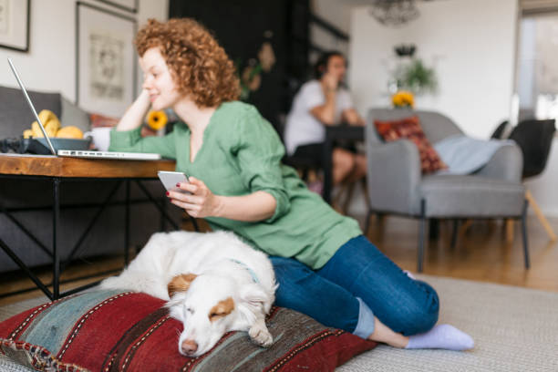 istock Happy young Caucasian redhead woman working from home 1277579191