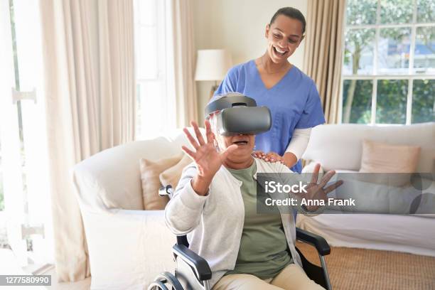 Astonished Senior Woman With Vr Glasses Stock Photo - Download Image Now - Virtual Reality Simulator, Virtual Reality, Senior Adult