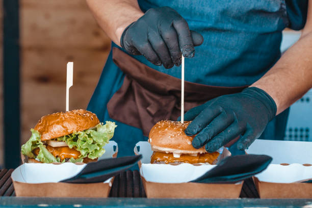 istock The chef’s hands prepare the burgers for serving 1277581768