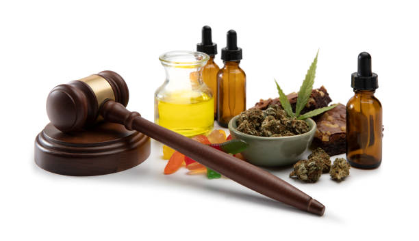 Legal Cannabis oils and bud in a small bowl surrounded by sweet edibles This is a stock photograph involving cannabis, marijuana and its implications in America has just slowly been legalized and used for medicinal and medical purposes and what that means to our economy and culture. bud candy stock pictures, royalty-free photos & images