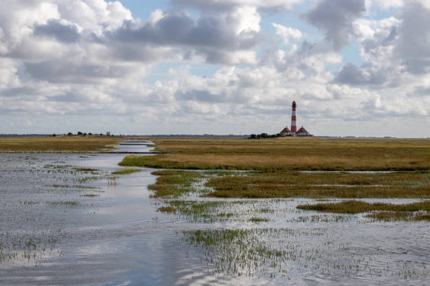 istock Tideway at the Westerheversand lighthouse at high tide 1277583234