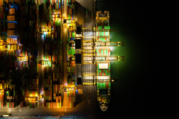 istock Container , container ship in export and import business and logistics. Shipping cargo to harbor by crane. Water transport International. Aerial view and top view. 1277583523