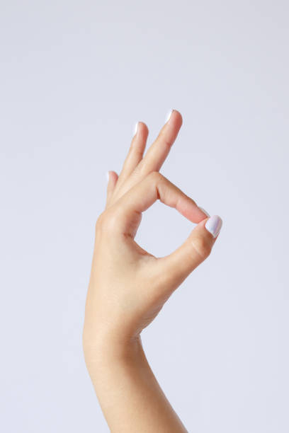istock Gesture and sign, hand on a white background. Hand showing ok 1277584384