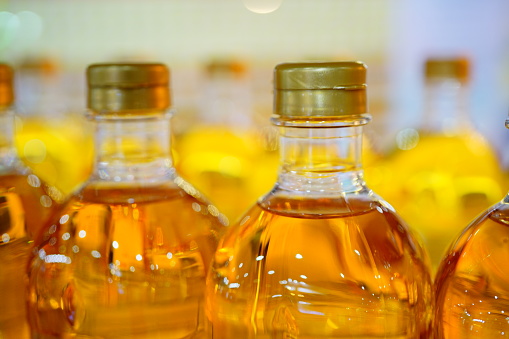 Close-up plastic bottle of palm or vegetable cooking oil