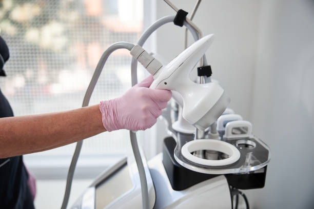 istock Eldelry man having an ultrasonic cavitation procedure for his legs 1277587921