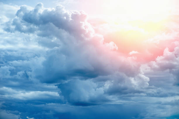 istock divine sky. clear blue sky with Cumulus clouds before a thunderstorm at sunset. Thunderclouds in the sky 1277589431