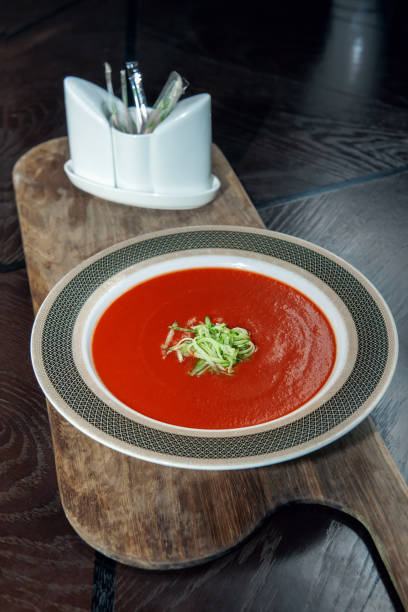 istock Gazpacho diet tomato soup with herbs and cucumber on a plate 1277589988
