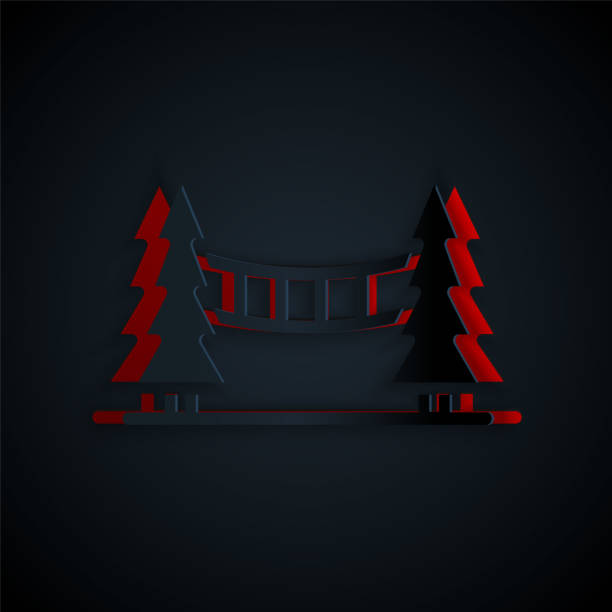 istock Paper cut Capilano Suspension Bridge in Vancouver, Canada icon isolated on black background. Paper art style. Vector 1277591081
