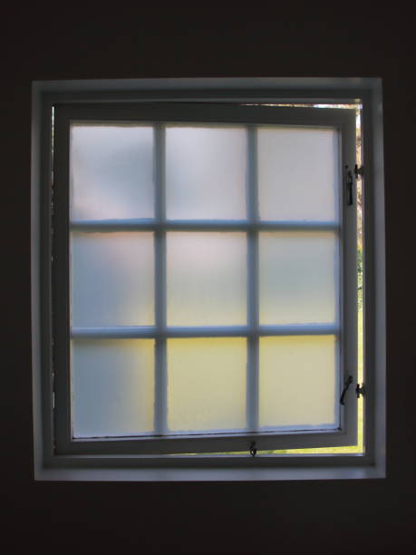 istock Isolated Old Open Frosty Bathroom Window Backlit 1277592254