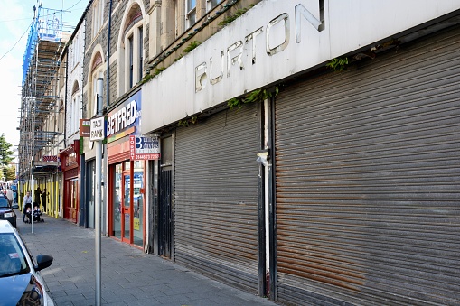 Barry, Vale of Glamorgan / Wales - Sept 29 2020: Coronavirus crisis causes global recession hitting retail sector hard. High street shop shut down, ghost towns and urban decay becomes the new normal