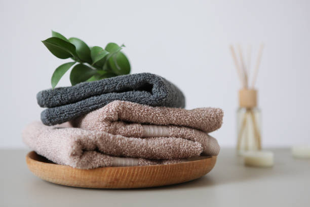 istock a stack of fresh towels on the table. 1277598494
