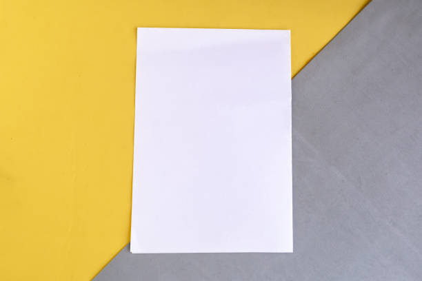 istock White mockup blank on geometric grey and yellow background, copy space for the text 1277599078