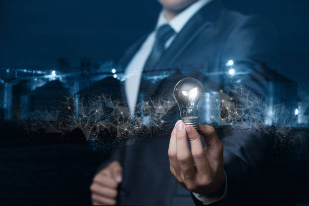 istock A businessman shows a light bulb with a burning sprout inside . 1277604396