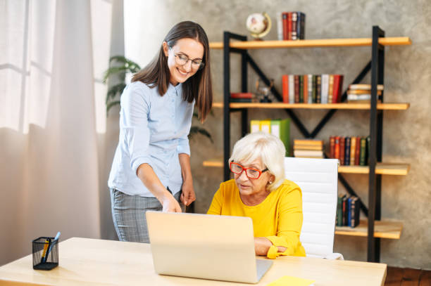 istock Two female colleagues in the office using a laptop 1277605845