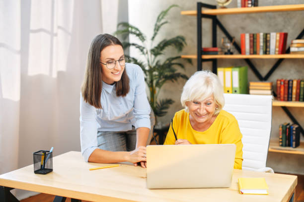 istock Two female colleagues in the office using a laptop 1277605852