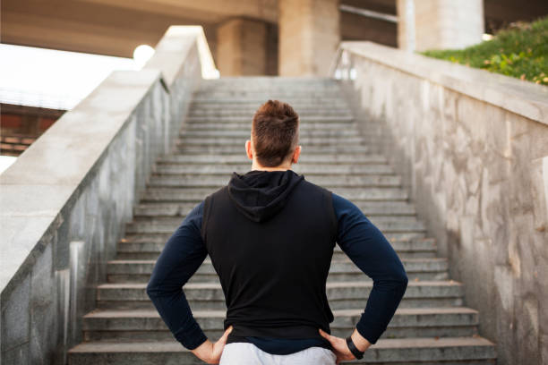 istock Young man exercising in urban environment 1277606293