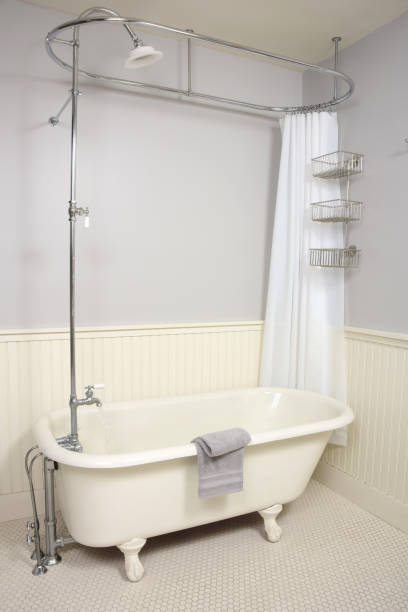 istock Vintage Freestanding Clawfoot Bathtub and Shower 1277610596