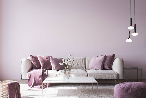 istock Modern sofa on light pink wall background with trendy home accessories, home decor interior, luxury living room. Stock photo 1277610671