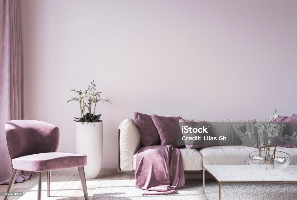 Modern sofa on light pink wall background with trendy home accessories, home decor interior, luxury living room. Stock photo Modern sofa on light pink wall background with trendy home accessories, home decor interior, luxury living room Purple Stock Photo