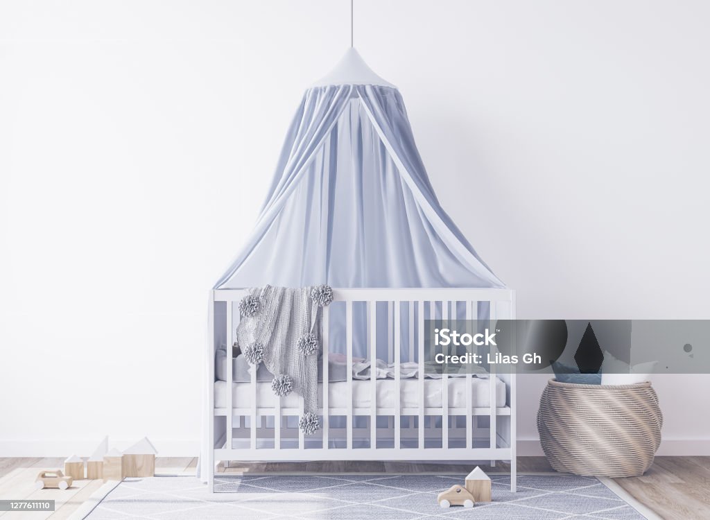interior of a bedroom for newborn baby, white crib with blue canopy, minimal interior design. Stock photo interior of a bedroom for newborn baby, white crib with blue canopy, minimal interior design Nursery - Bedroom Stock Photo