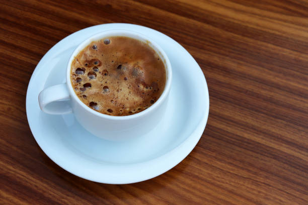 istock Cup of coffee in a white saucer 1277613434