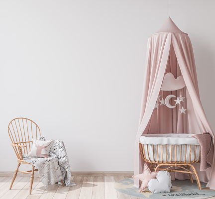 Natural wooden furniture for kids room in Scandinavian interior style, empty wall in bright newborn bedroom
