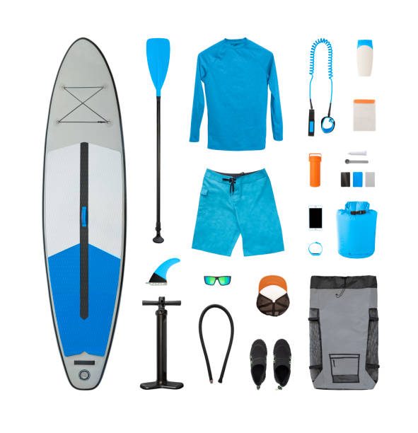 Sup and clothes Flat lay of SUP, clothes and accessories isolated on white paddleboard photos stock pictures, royalty-free photos & images