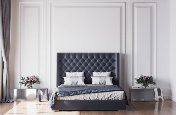istock Bedroom mock up, luxury interior design template. Grey wall mockups with large bed and modern silver side tables. Stock photo 1277614948