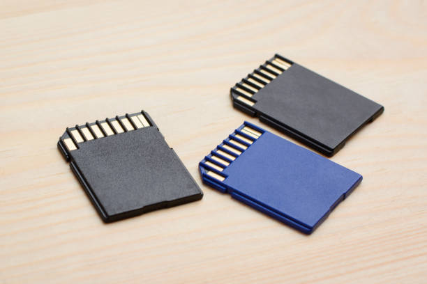 istock Modern fast SD memory cards on wooden table ready to use in different devices 1277616733