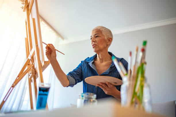 istock Senior artist working in concentration. 1277621754